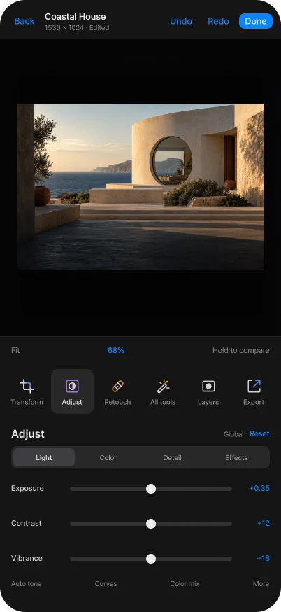 Dreamscapes compact image editor with a warm architectural image and adjustment controls